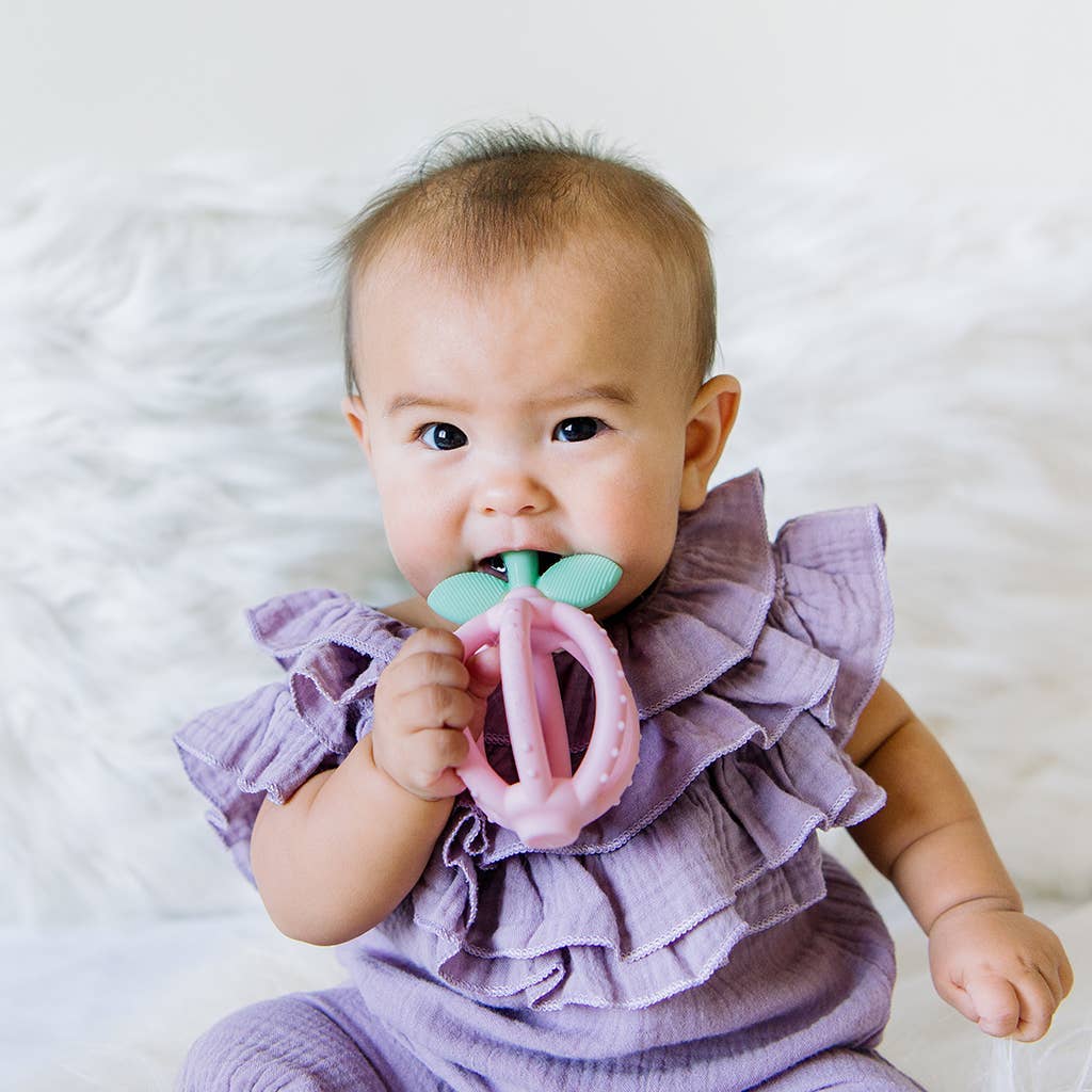 Itzy Ritzy Bitzy Biter™ Teething Ball Baby Teether Pink Lemonade